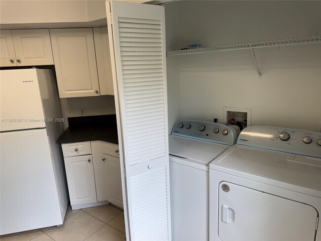 Building Photo - $2,400MONTHLY;9615 NW 1ST CT #10-301 PEMBR...