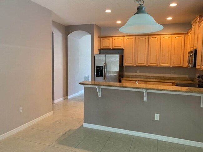 Building Photo - Beautiful 4/2 home in Lovely Venetian Bay ...