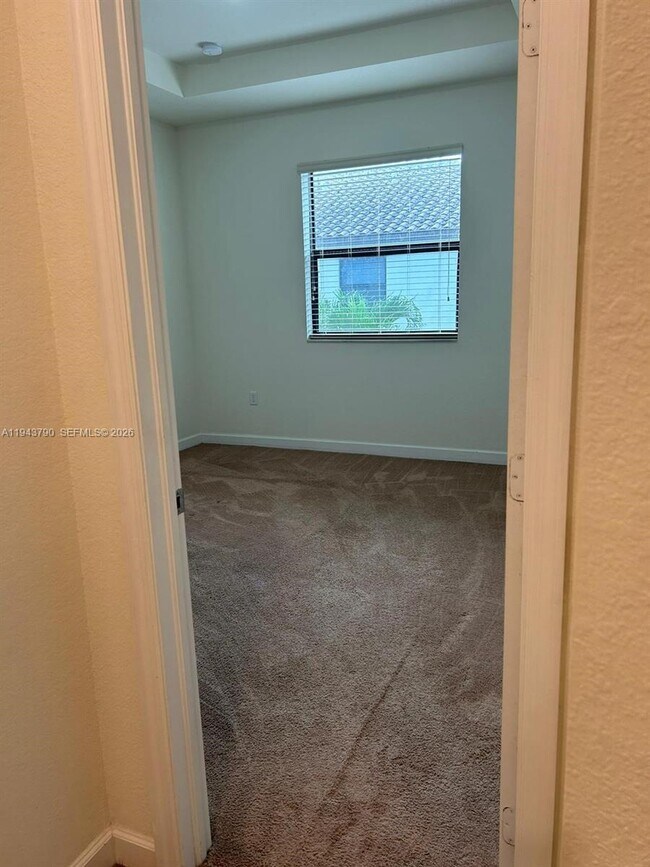 Building Photo - 9332 W 33rd Ln