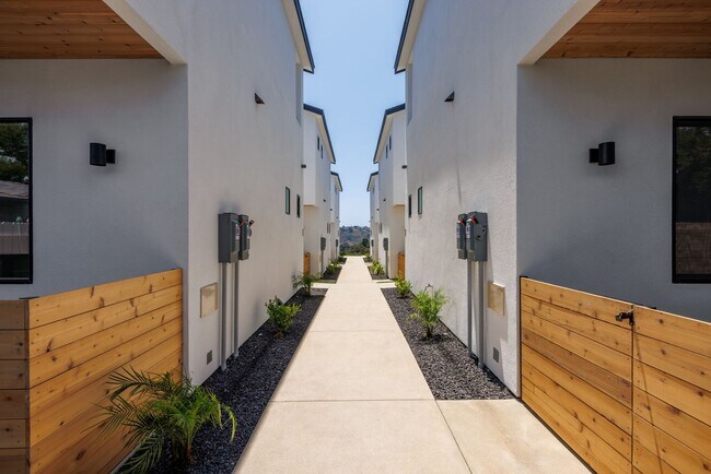 Building Photo - BRAND NEW Top Floor Home Available! 1 Bedroom, In-Home Laundry, Parking, View