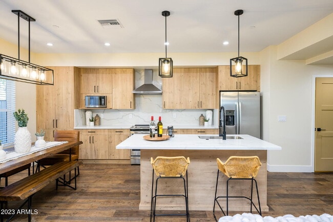 Building Photo - Exclusive Urban Sanctuary—Sophisticated Townhouse in Vibrant Phoenix