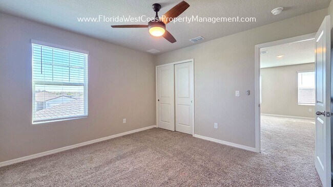 Building Photo - BRILLIANT and SPACIOUS! 4 BEDROOM/2.5 BATH PLUS LARGE BONUS-FLEX SPACE and FENCED YARD!