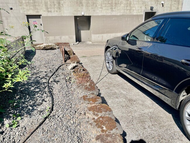 Building Photo - Prime Location! Modern 2BD/1 BA with A/C & EV Charging Steps from Mississippi