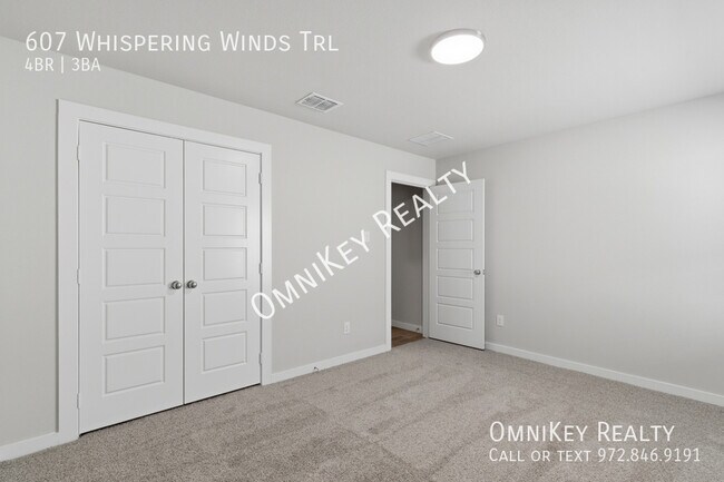 Building Photo - 607 Whispering Winds Trl