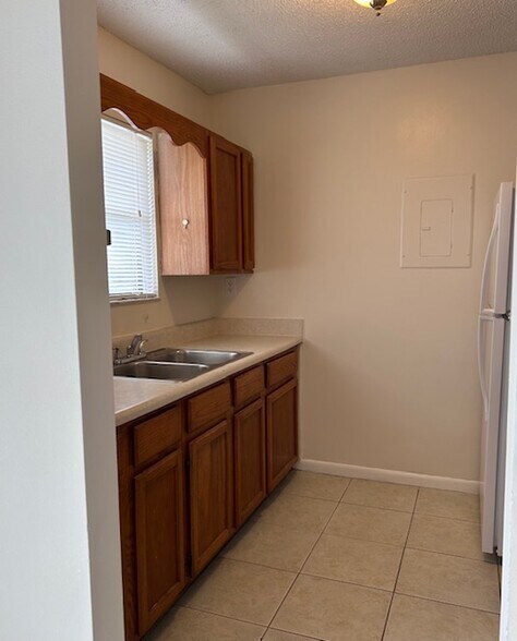 Galley Kitchen left - 9927 Byrnes Rd