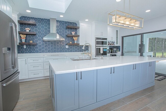 Building Photo - Beautifully Updated 3/2 Pool Home with Large Backyard in Lake Ajay (Gated Community)