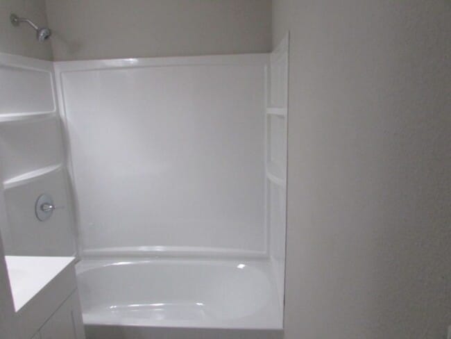 Building Photo - Renovated Three Bedroom/One Bath Duplex