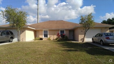 Building Photo - Spacious 2/2 with garage in family neighbo...