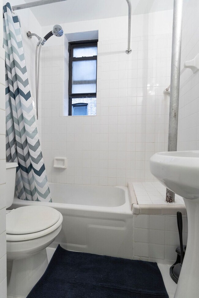 Building Photo - 309-311-311 E 95th St