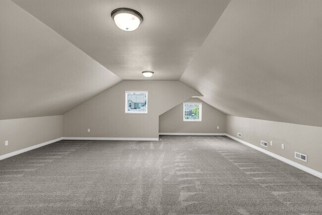 Building Photo - Spacious Syracuse Home with Covered Deck, Loft & Oversized 3-Car Garage