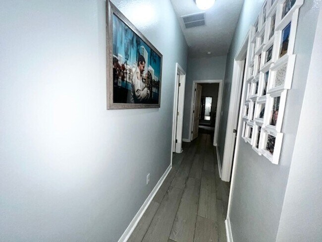 Building Photo - Lake Nona!! Spectacular 4X2 in Gated Nona Crest! All tile flooring!! 2 car garage! Move in April ...