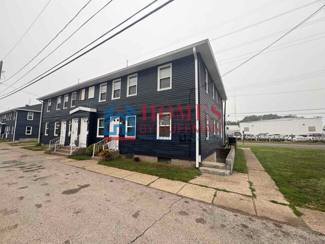 Building Photo - One Bedroom Apartment | Laundry Facility | Utilities Included