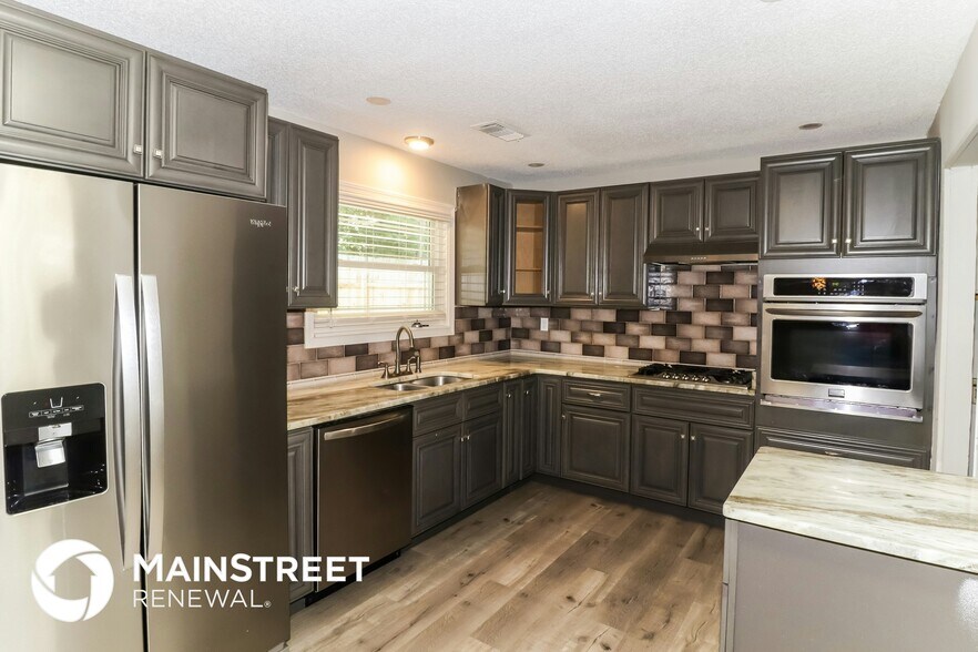 Building Photo - 5707 Heartwood Dr