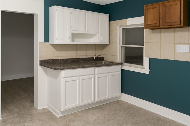 Building Photo - Turnkey Northside Duplex – Fully Renovated...