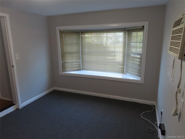 Building Photo - 1210 Smithtown Ave