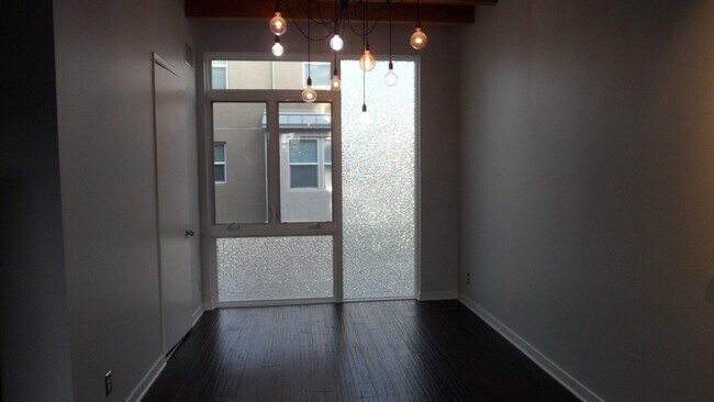 Building Photo - Office Space Living 2 BR 2.5 BA Attached 2 Car Garage