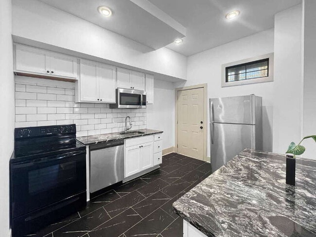 Building Photo - 310 W 42nd St