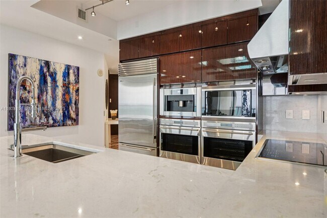 Building Photo - 9703 Collins Ave
