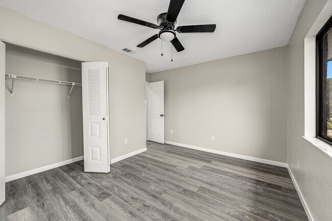 Building Photo - Charming Palm Bay Retreat - Perfect for Relaxation and Entertainment!
