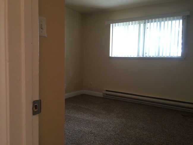 Building Photo - Charming 2-Bed, 1-Bath Townhome with Covered Garage – Great Location!