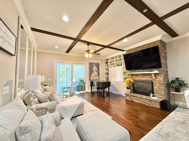 Building Photo - Luxurious 3BD, 4BA Raleigh Townhome with a Bonus Sunroom, Jacuzzi, and Large Upstairs Loft within...