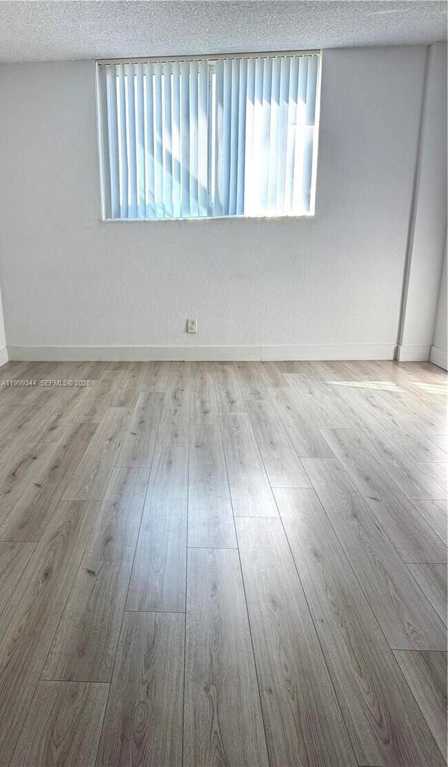 Building Photo - 19380 Collins Ave