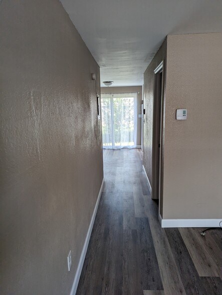 Hall to kitchen/dining - 1/2 bath to the right - 3526 Butternut Dr