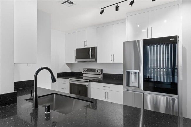 Building Photo - Stunningly Remodeled Studio High-Rise Unit For Rent