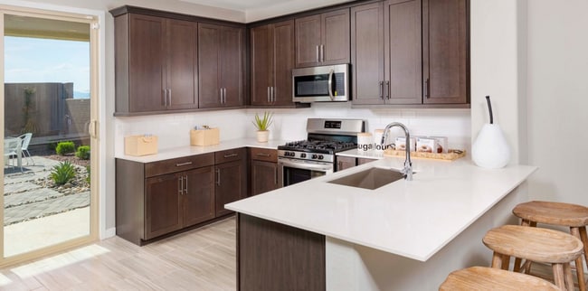 Quartz counters/ Breakfast Bar seating - 9509 W Sells Dr