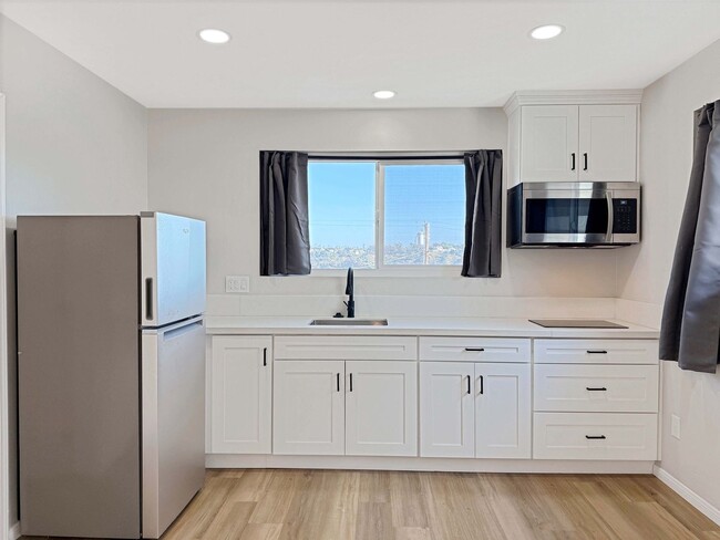 Building Photo - Beautiful Studio Style Condo in Morena w/ ...