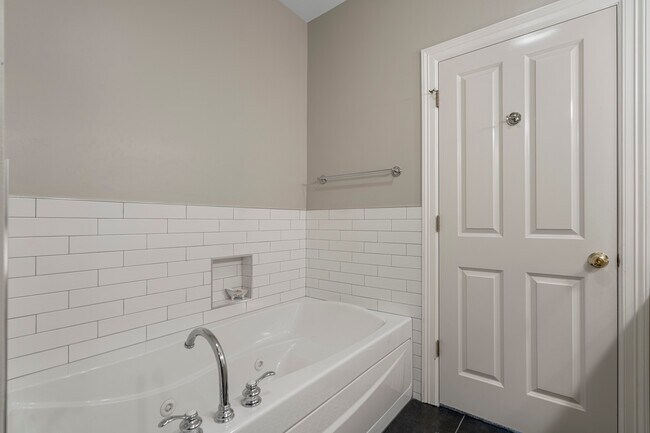 Jetted tub with new tile surround - 1117 E 7th St