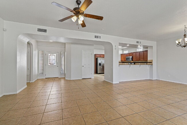 Building Photo - "Spacious 4-Bed Oasis with Granite Touches...