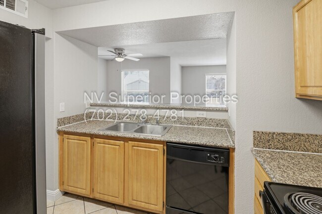 Building Photo - SW!! First floor unit with Balcony!! Gated!! Clubhouse!!  Community pool!! Spa!! Exercise Room!! ...