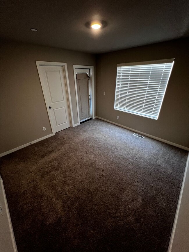 Building Photo - Spacious 4-Bedroom Townhome with Loft, Che...