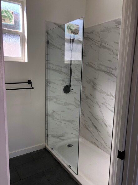 A - Walk-in tile shower in both bathrooms - 3015 Warwick Ave