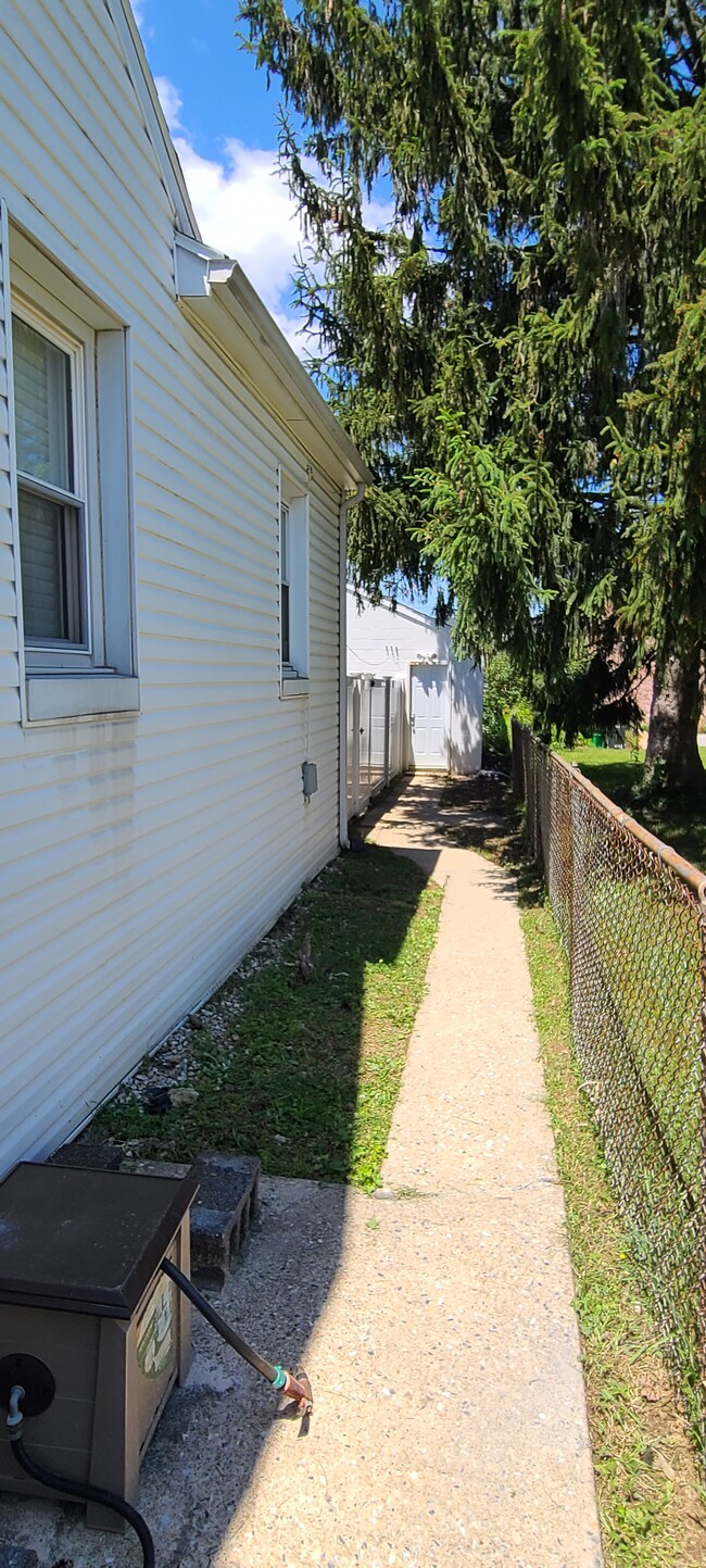 Side walk from home to garage - 1037 E Prospect St