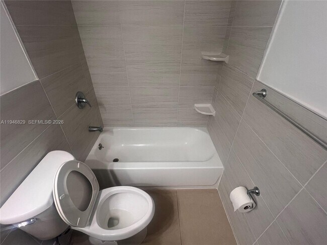 Building Photo - 5010 SW 26th Ave