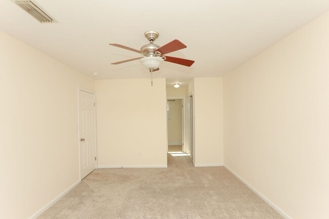 Building Photo - Spacious 4BR Home with a Fenced Yard & Jetted Tub