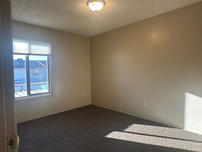Building Photo - 2+1.5 READY NOW! Assigned parking. ON-SITE...