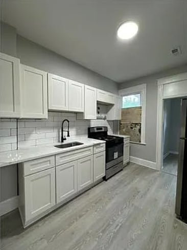 Building Photo - 4 Bedroom 2 Bathroom Rehabbed