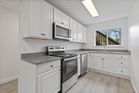 Building Photo - Modern Living Meets Natural Beauty – Welcome to the Newly Updated Kennedy Park Apartments