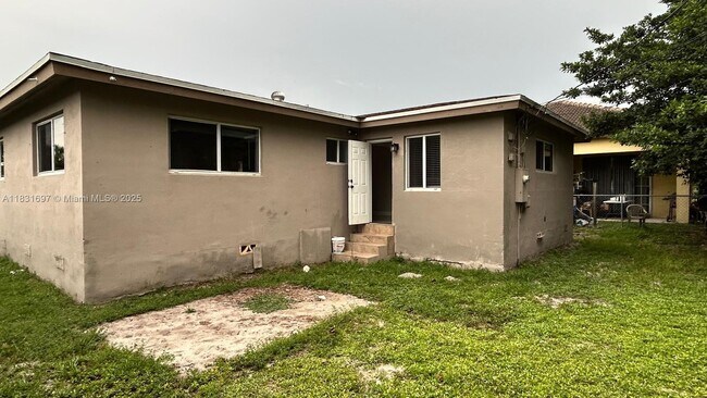 Building Photo - 2771 NW 11th Ct