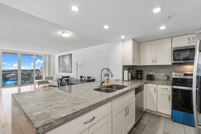 Building Photo - 5599 Collins Ave