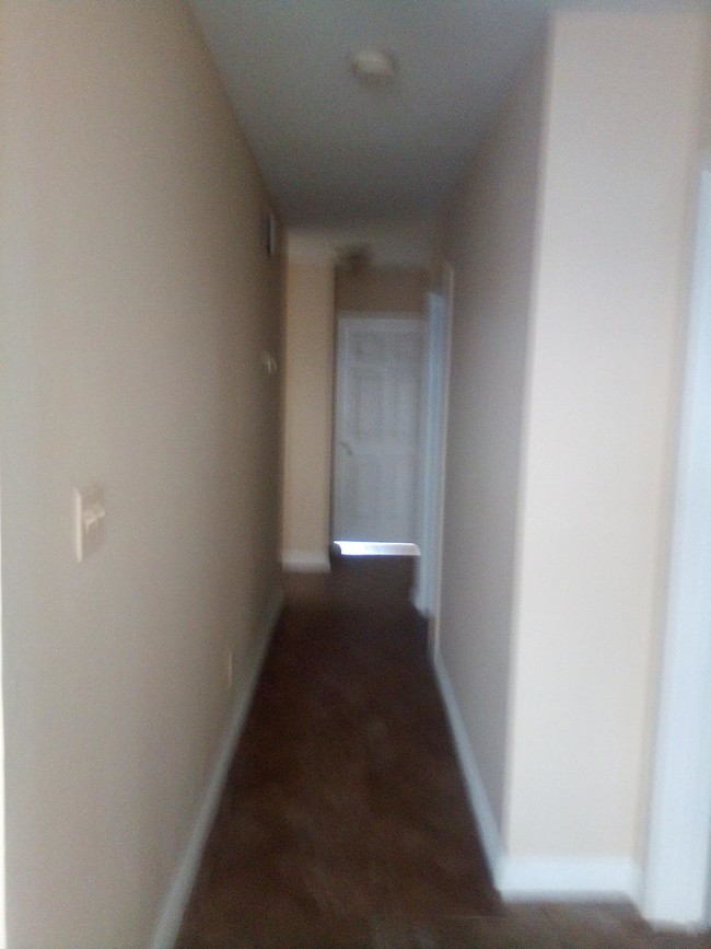 hall way to the bedrooms - 2106 S Ridgeley Dr