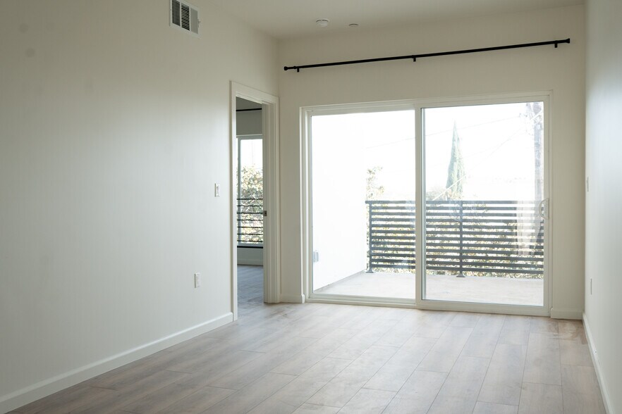 3rd Level Living Area + Private Balcony - 5259 Lexington Ave