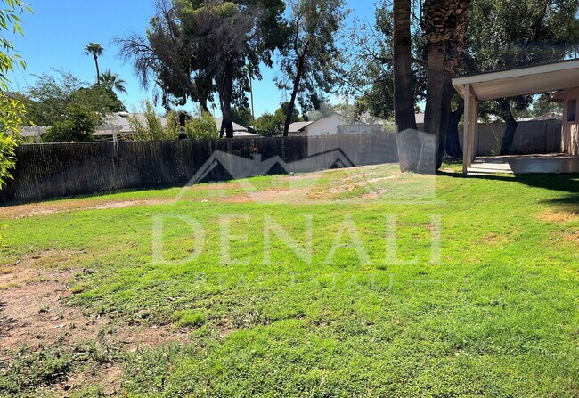 Building Photo - 5129 E Emile Zola Ave