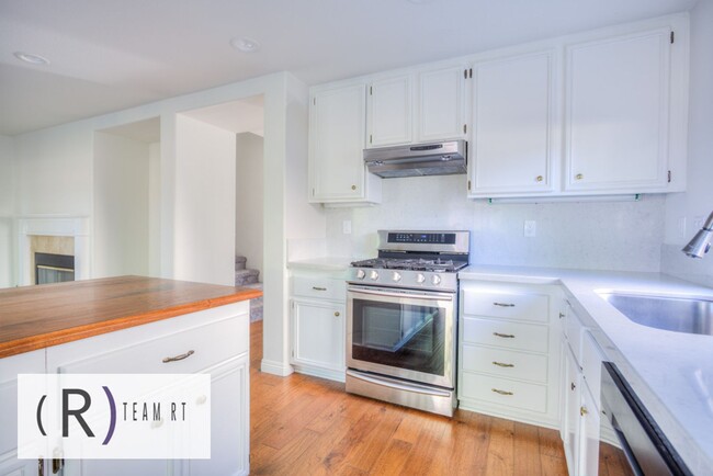 Building Photo - A Captivating and Charming 2 Story Home Ne...