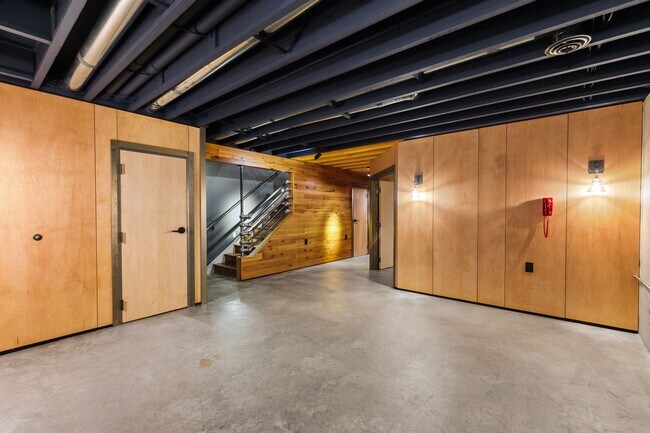 Stunning maple walls "float" off the floor. Perfect ceiling for a great sound system. - 924 Eleanor Ave