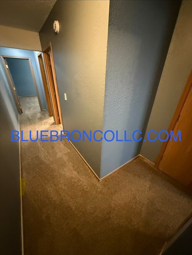 Building Photo - Updated unit with fresh paint and modern finishes!