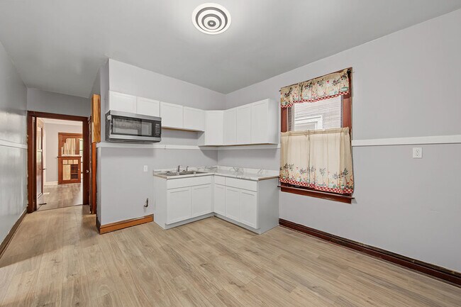 Building Photo - 8748 S Marquette Ave